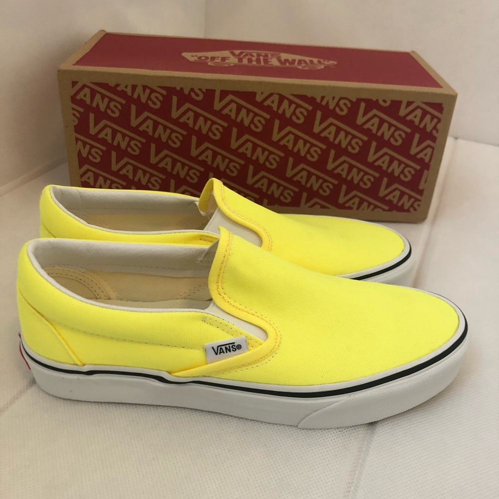 Brand new yellow Vans classic slip-on